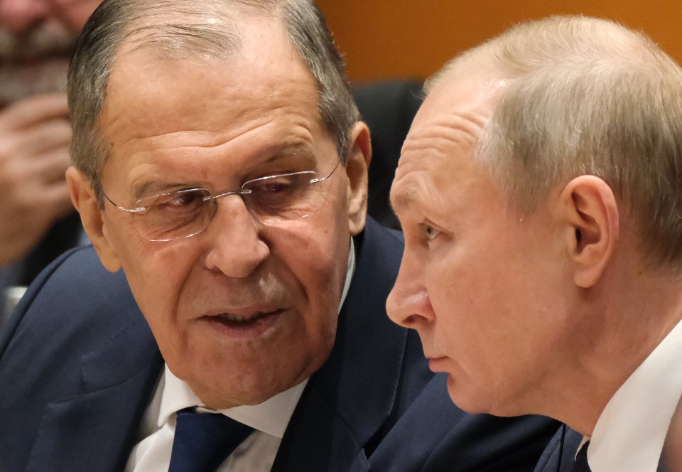 Vladimir Putin with his foreign minister Sergei Lavrov