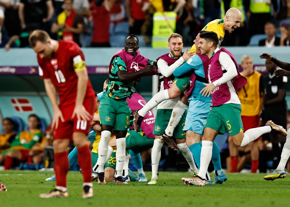 Eriksen reacts as Australia celebrate qualifying for the knockouts