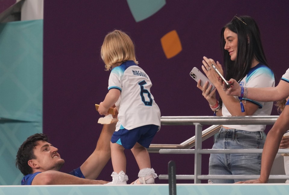 Despite Maguire coming off with illness, he was well enough to join his wife Fern Hawkins and daughter Lillie Saint in the stands after the match