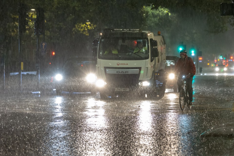 Roads flooded and sparked travel chaos as showers brought a massive 28mm of rain lashing down in some areas