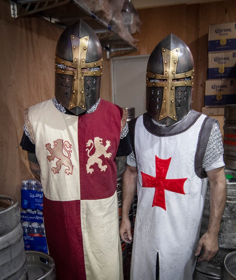 The two fans say they were stopped wearing Crusaders' outfits