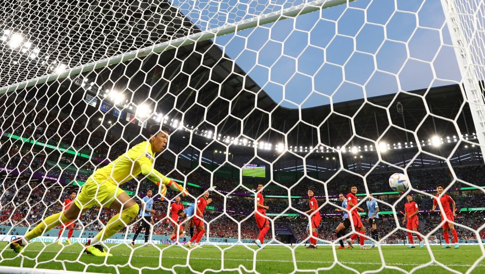 Diego Godin’s header crashed against the post as Uruguay were held by South Korea