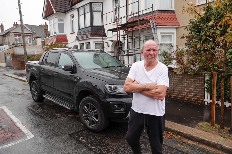 Dennis Skipper, 71, reserves a parking space for his Ford truck with an usual method