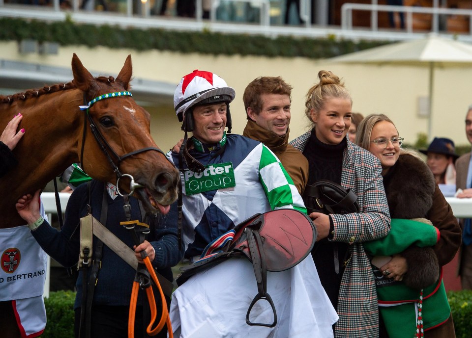 Thomas, middle, here with jockey Sam Twiston-Davies, celebrates victory with Before Midnight, a horse owned by Walters