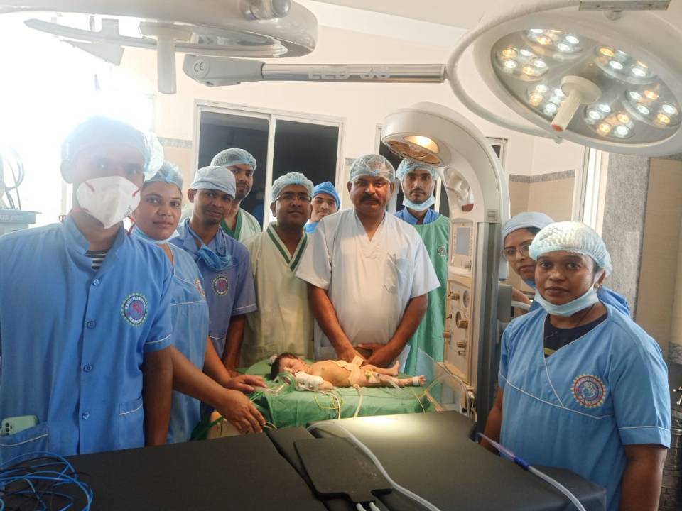 The team of medical staff that removed the embryos from the stomach of the young girl are pictured above