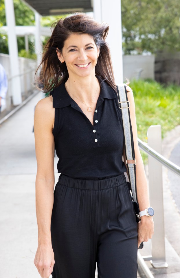 Gina Colagangelo wore a chic black jumpsuit as she arrived at Brisbane Airport after her 24-hour journey