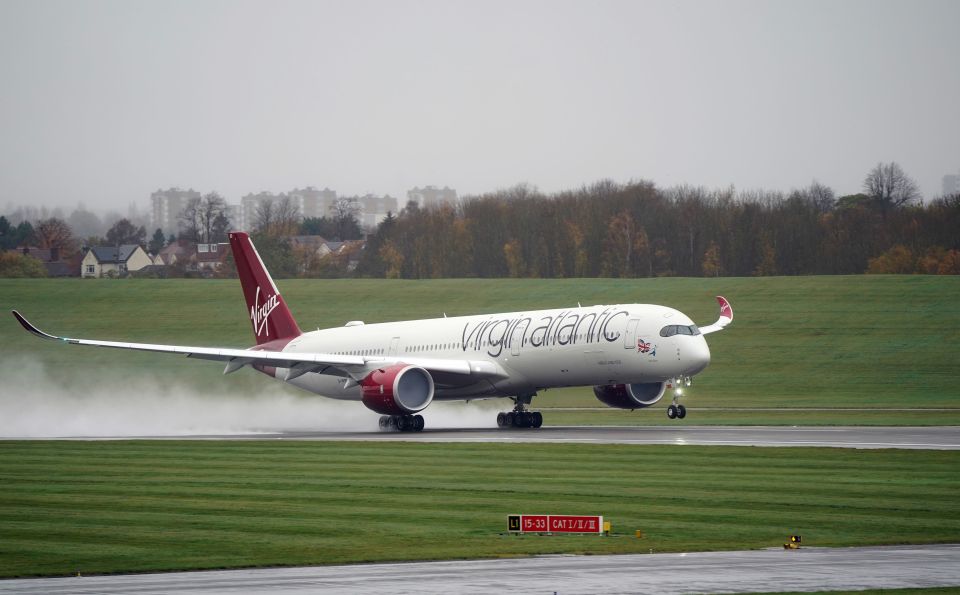 The squad made the seven-hour flight in Virgin Atlantic's Gay Pride Airbus, dubbed Rain Bow, to back gay rights