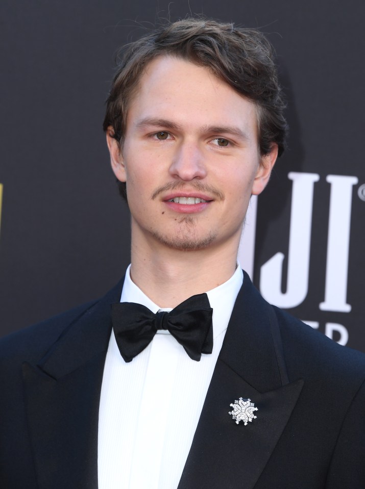 Ansel Elgort plays journalist Adelstein