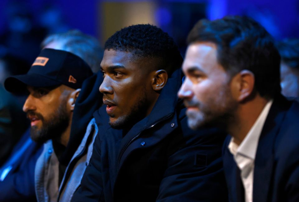 Joshua and promoter Eddie Hearn were watching ringside