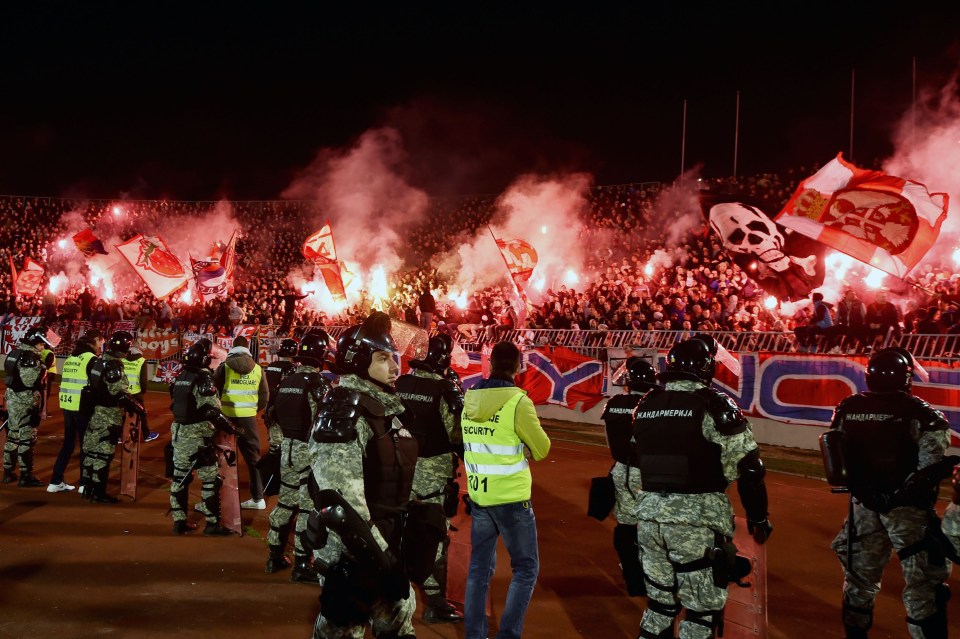 Serb ultras are known for attacking players and throwing flares at players and police