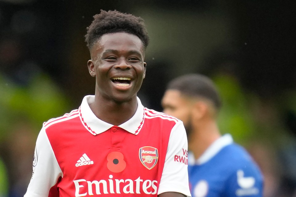 Saka was all smiles at Stamford Bridge as Arsenal returned top