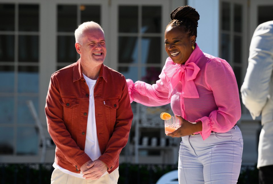 Chris shares a laugh with Charlene White