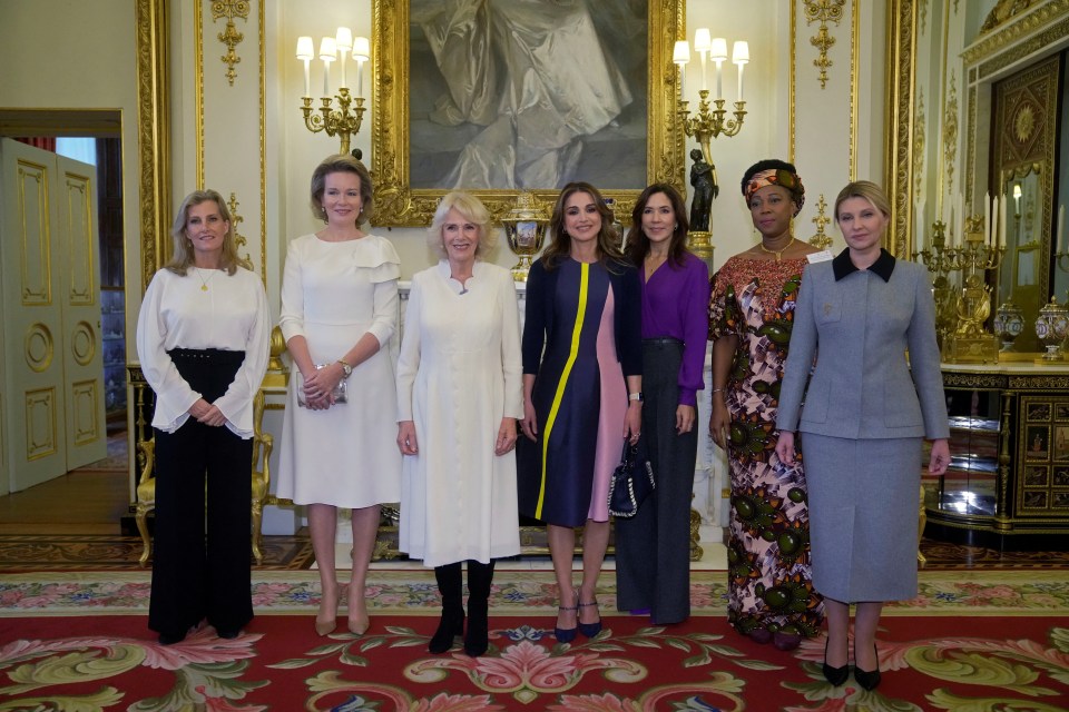 Left to right: Sophie, the Countess of Wessex, Belgium's Queen Mathilde, Britain's Queen Camilla, Jordan's Queen Rania, Denmark's Crown Princess Mary, Sierra Leone's first lady Fatima Maada Bio, and Ukraine's first lady Olena Zelenska