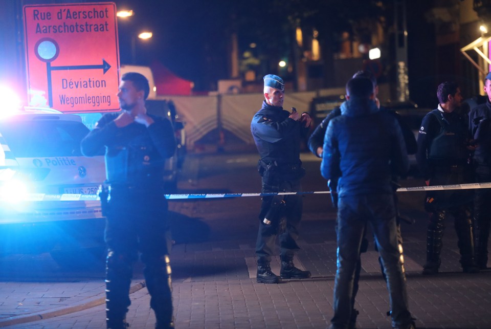 Police officers at the scene of the attack