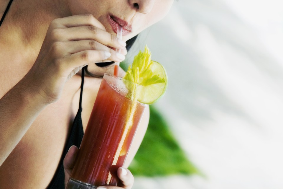 Experts recommend drinking water and ginger ale while flying, while avoiding tomato juice