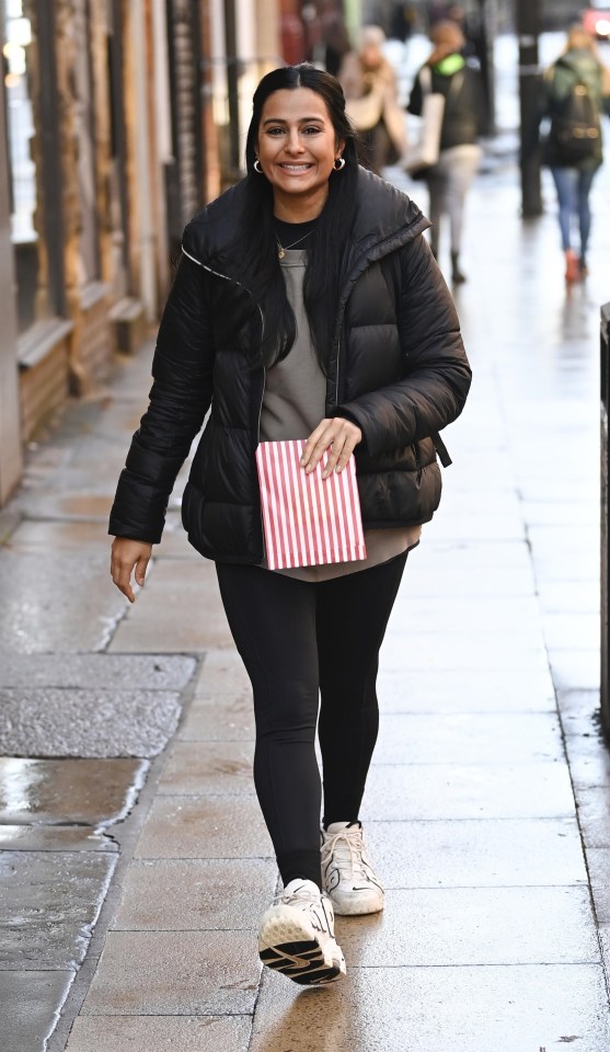 Alya Nazir actress Sair Khan arrived holding a stripy paper bag