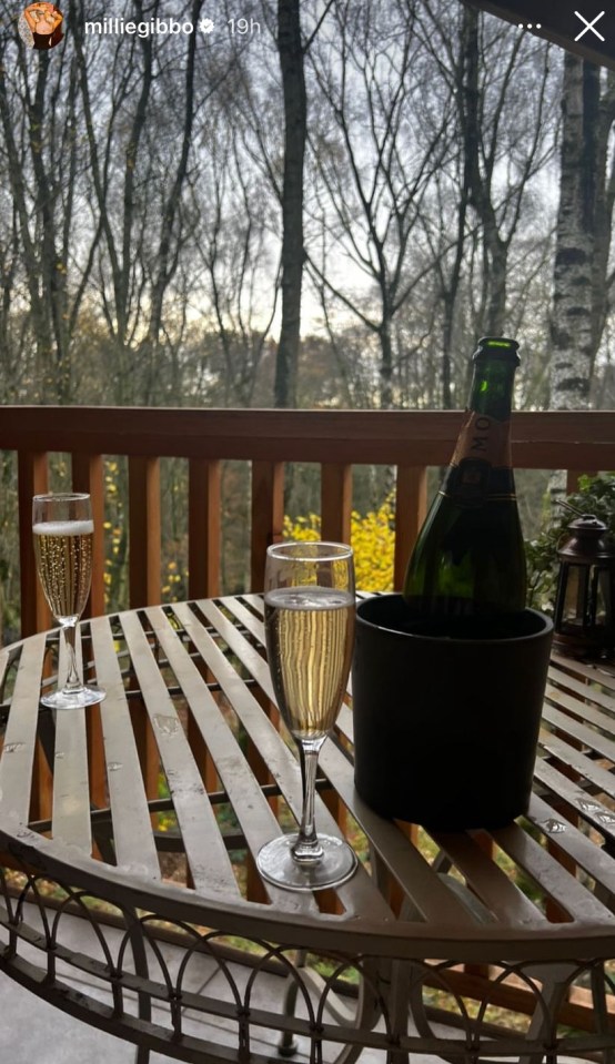 She shared snaps of the views on her balcony along with two glasses of Moet