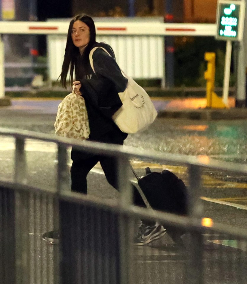 Harry Maguire's wife Fern was also spotted at Manchester Airport