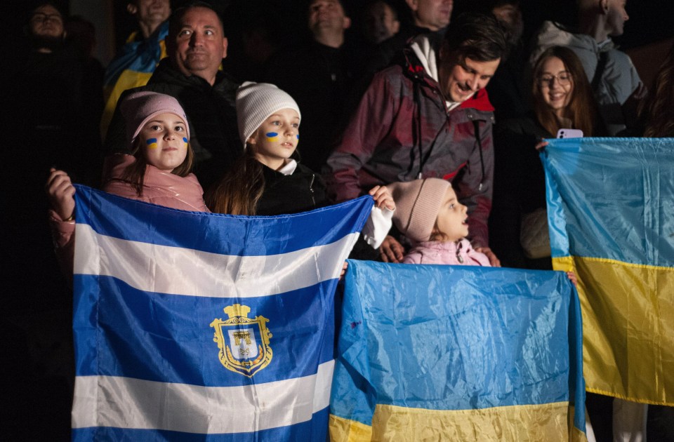 Ukrainians gather on the Independence square in Kyiv to celebrate the liberation of Kherson from Russian troops