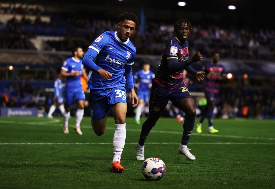 George Hall battles with Taylor Richards during a clash with QPR