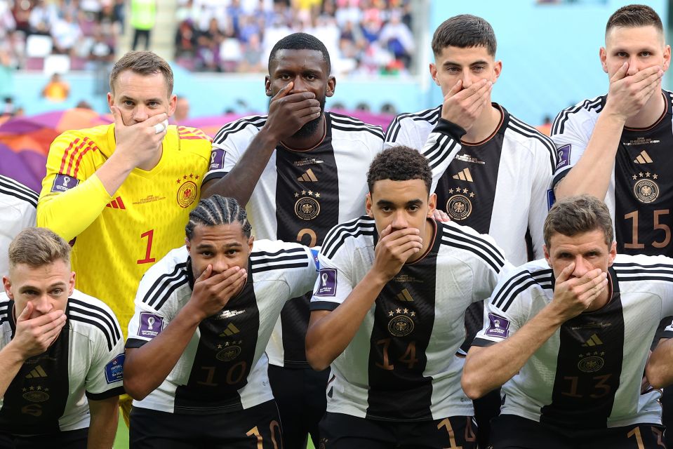 German players made the same gesture protesting Fifa's ban on their OneLove armbands