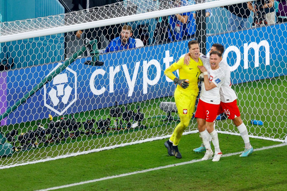 Szczesny was mobbed by his Poland team-mates after making the save