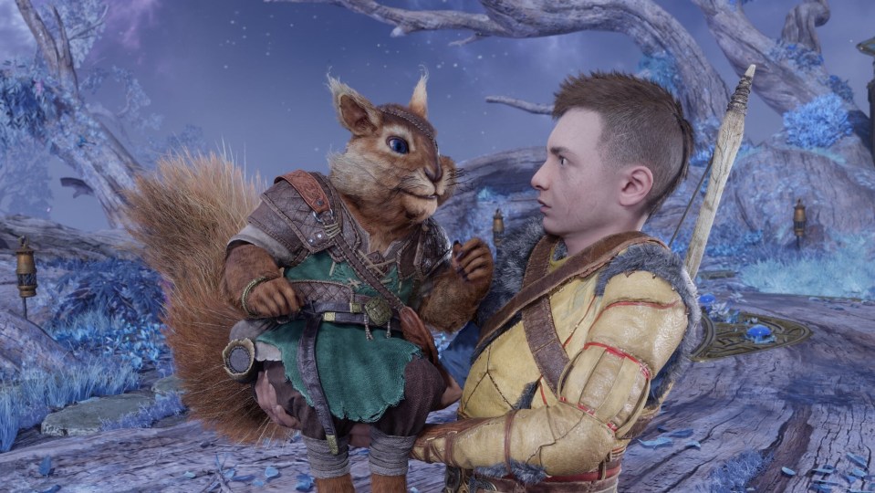 Atreus holding Ratatoskr, a squirrel in armor, in God of War Ragnarök.