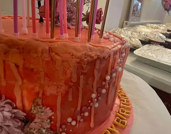 The cake seemed to be dripping with candle wax making it inedible