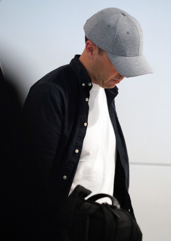 Matt wore an open shirt and a grey baseball cap as he landed in Oz