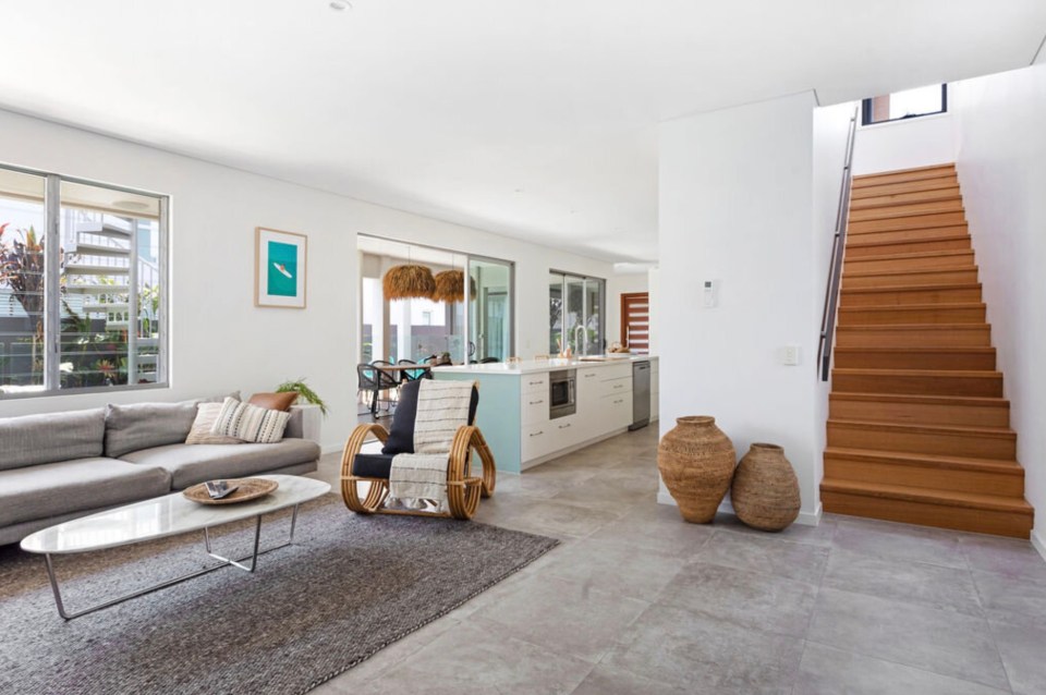 The beach house, which is located just one minute from the shore of the Gold Coast and sleeps ten, can be rented for a minimum of three nights for at least £596 a night