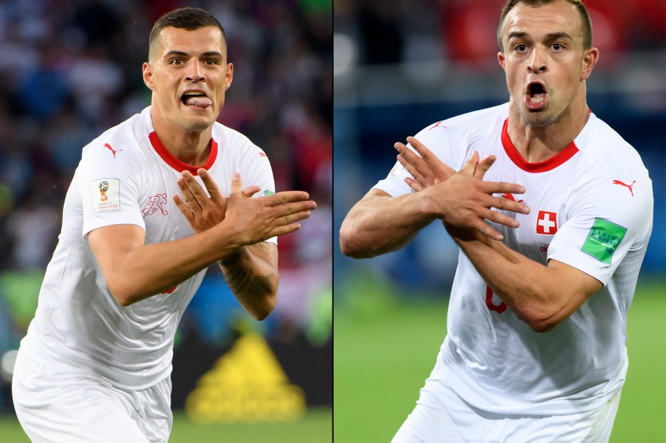 Xherdan Shaqiri and Granit Xhaka celebrate with Albanian nationalist symbols