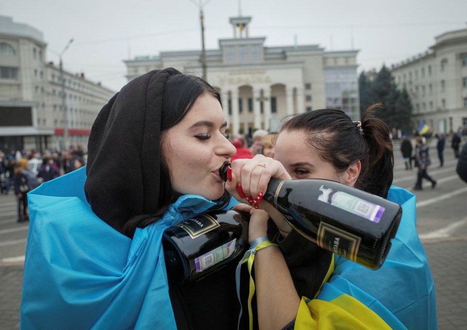 Locals down drinks in Kherson to celebate the Russian retreat