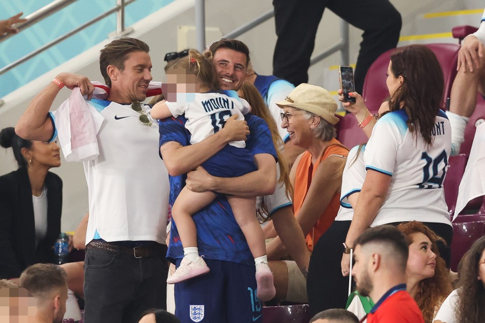 Mason Mount hugs his family after England’s win