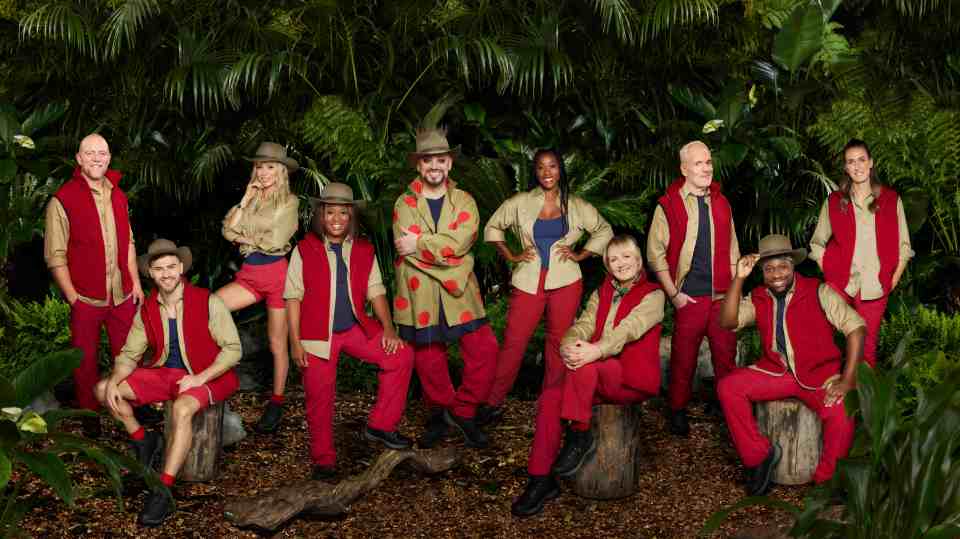 The 10 celebs going into the jungle on Monday night posed in their camp uniforms