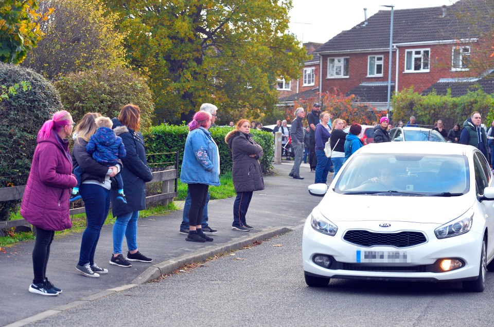 Parents outside Newcroft Primary Academy have formed a human picket line to prevent accidents