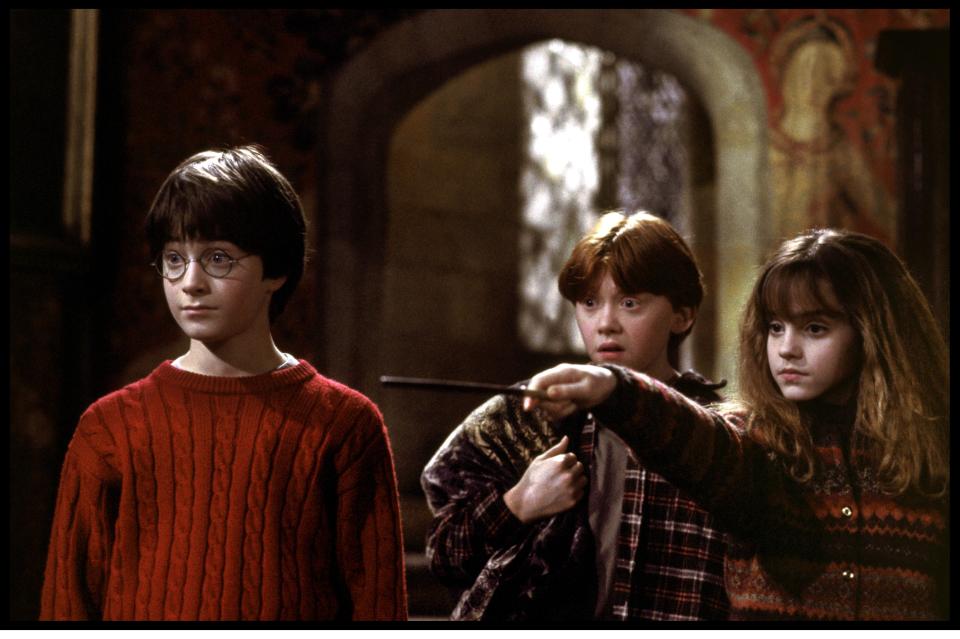 Rupert found fame playing Ron Weasley, centre, in the Harry Potter films