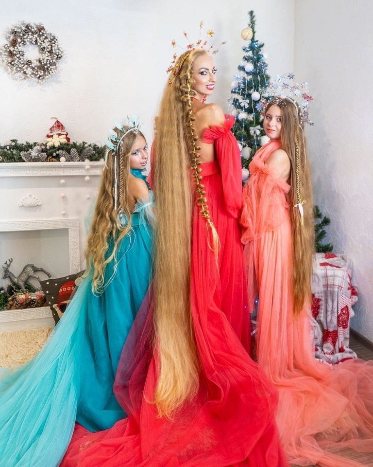 Alena Kravchenko and twin daughters Valeria and Miroslava are real-life Rapunzels