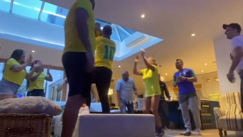 Richarlison wore his own Brazil shirt as he celebrated hearing his name read out in a room full of family