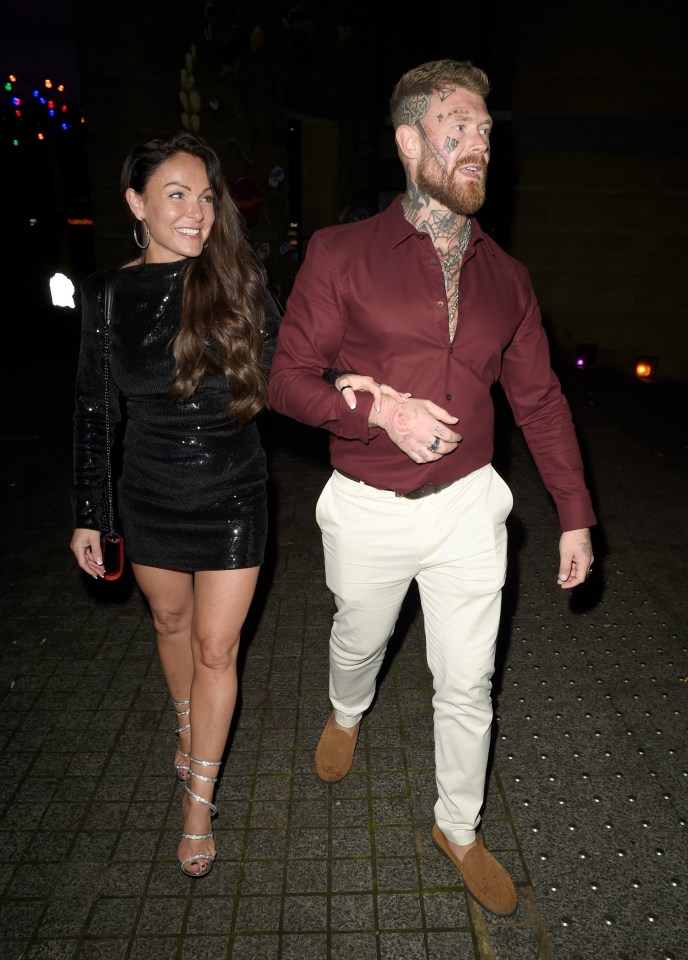 The pair linked arms on a night out