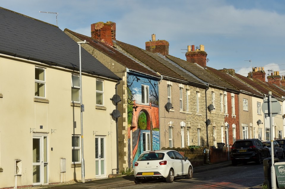 The brightly-coloured house on the street in Swindon