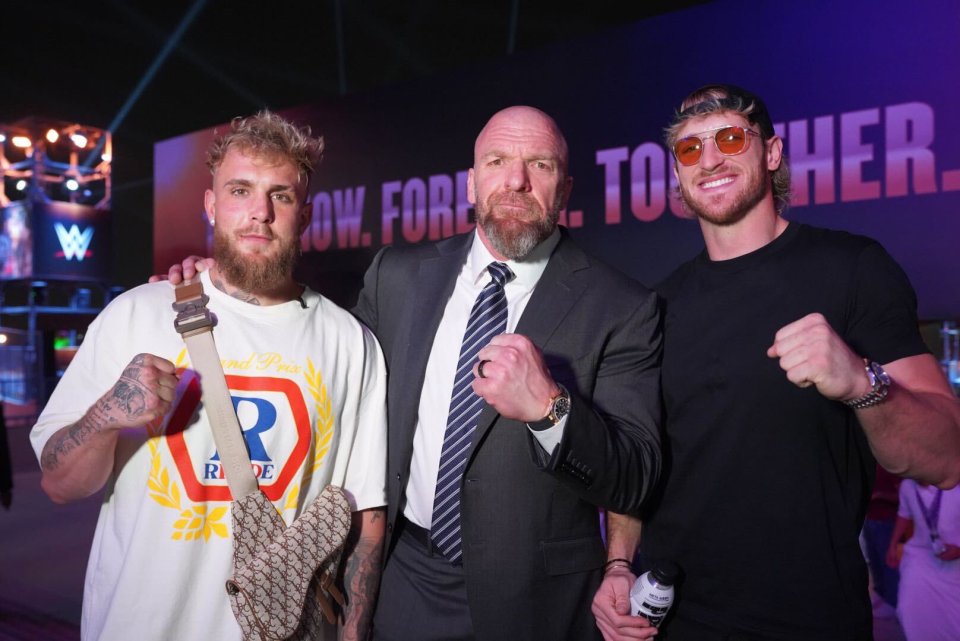 Jake Paul with WWE legend Triple H and brother Logan