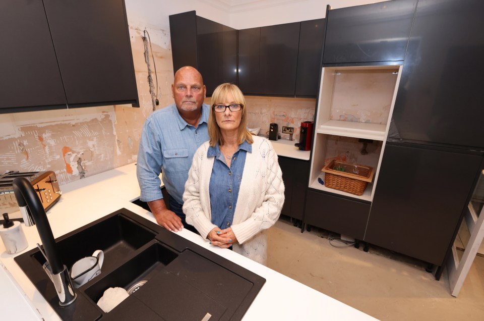 Barry and Jane Sanderson in their unfinished kitchen in Newcastle