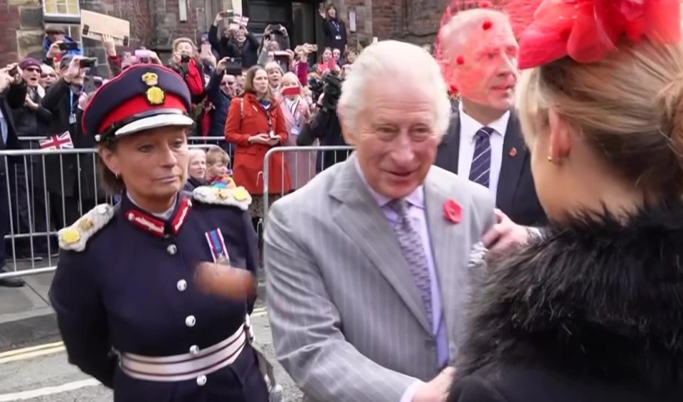 The moment an egg flew past the monarch after it was lobbed by a yob just last month