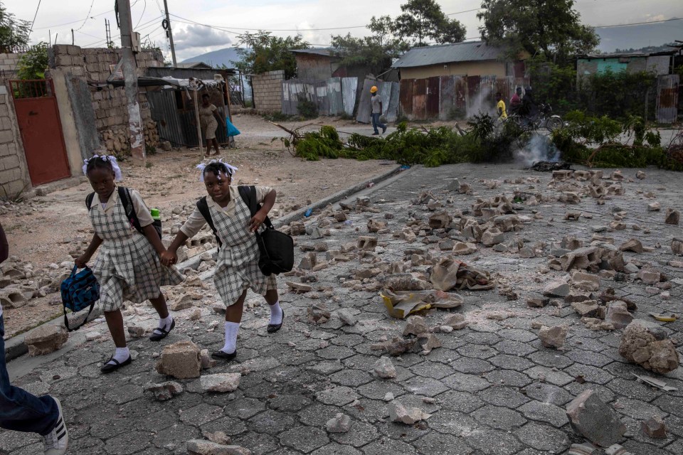 Barricades, bullets, rubble and ruin are just some of the daily obstacles facing children in Port-au-Prince