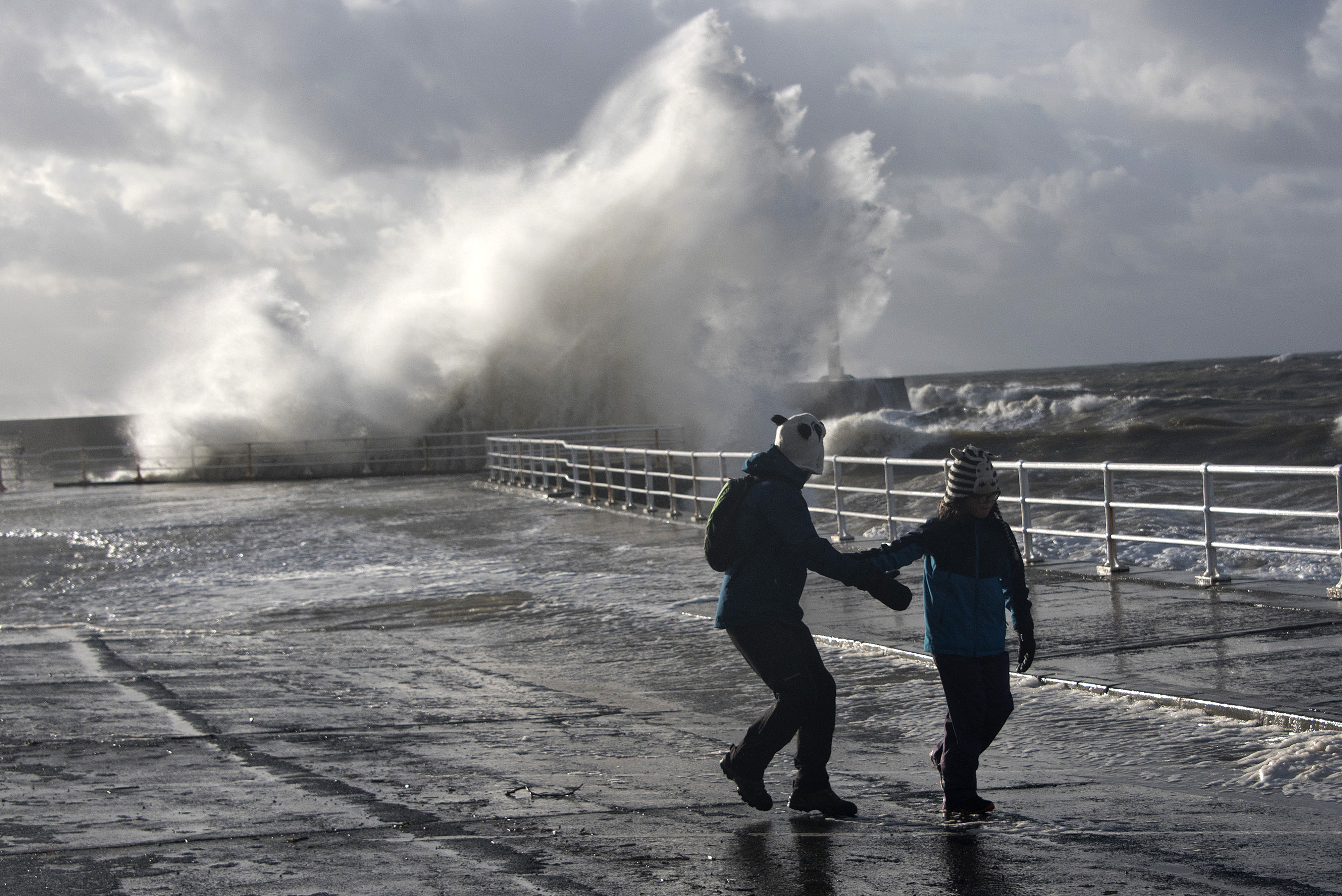 Strong winds and heavy rain in Wales has left the seafront flooded