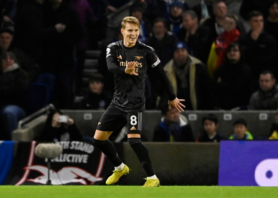 Martin Odegaard celebrates putting Arsenal 2-0 up against Brighton.