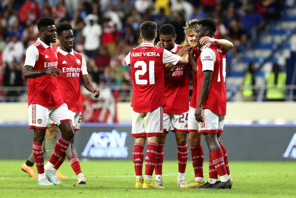 Arsenal players celebrate after Reiss Nelson made it 2-0