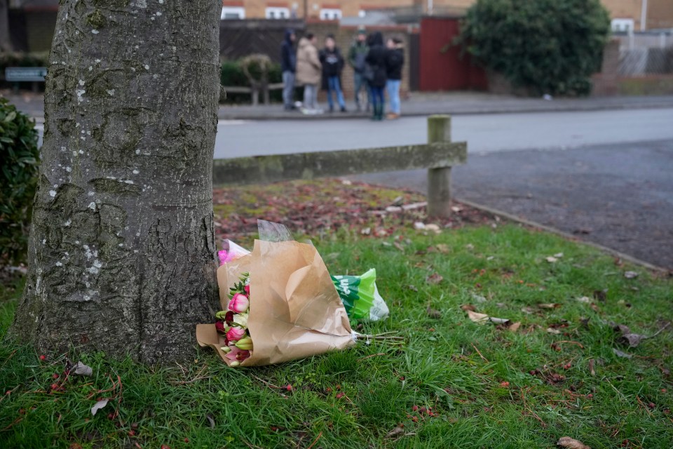 Flowers have been left at the scene in Solihull as the search continues