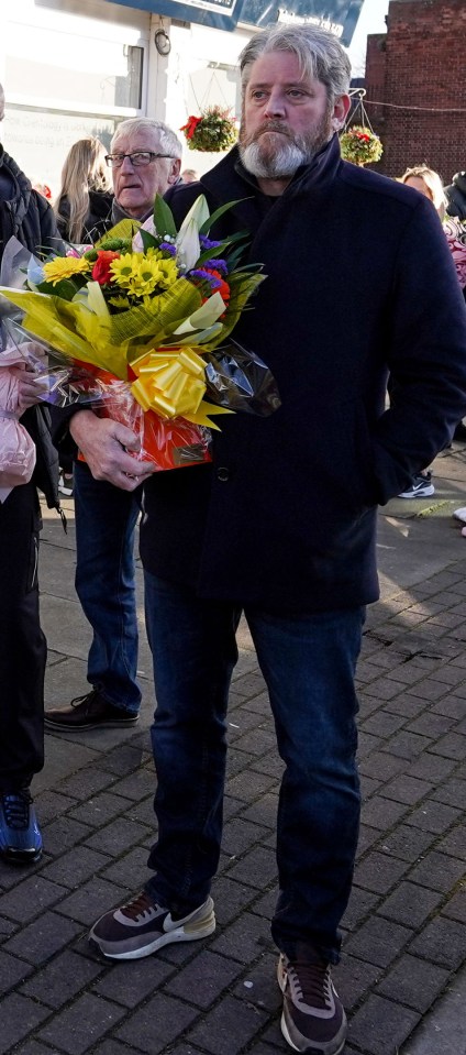 Elle’s heartbroken family, including dad Tim, left flowers at the scene on Boxing Day