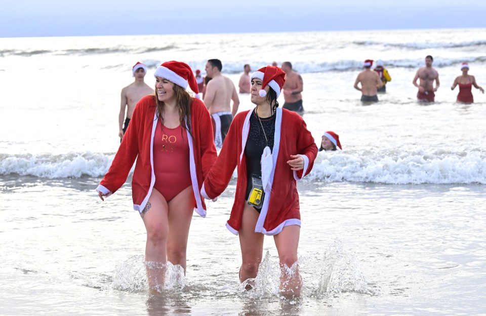 Other fancy dress revellers donned Santa hats